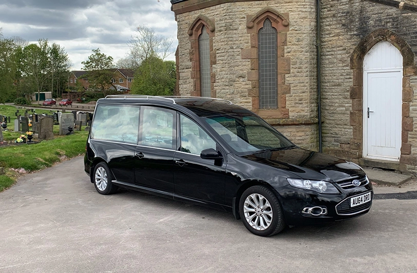AU64DRO – Ford Hearse - Front side