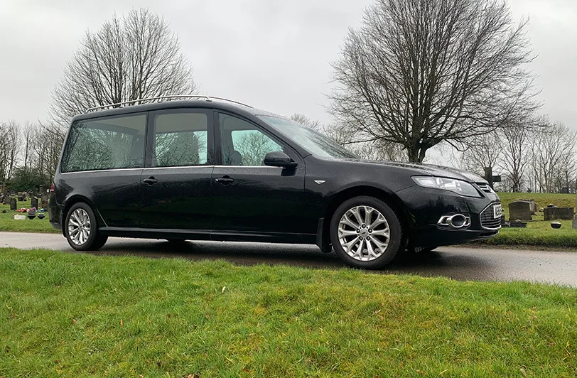 AE15EEU - Ford Hearse Side