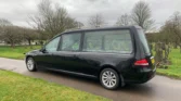 AE15EEU - Ford Hearse side
