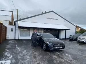 Wilcox Delivers a New Mercedes Limousine to Rolfe's Family Funeral Service ​