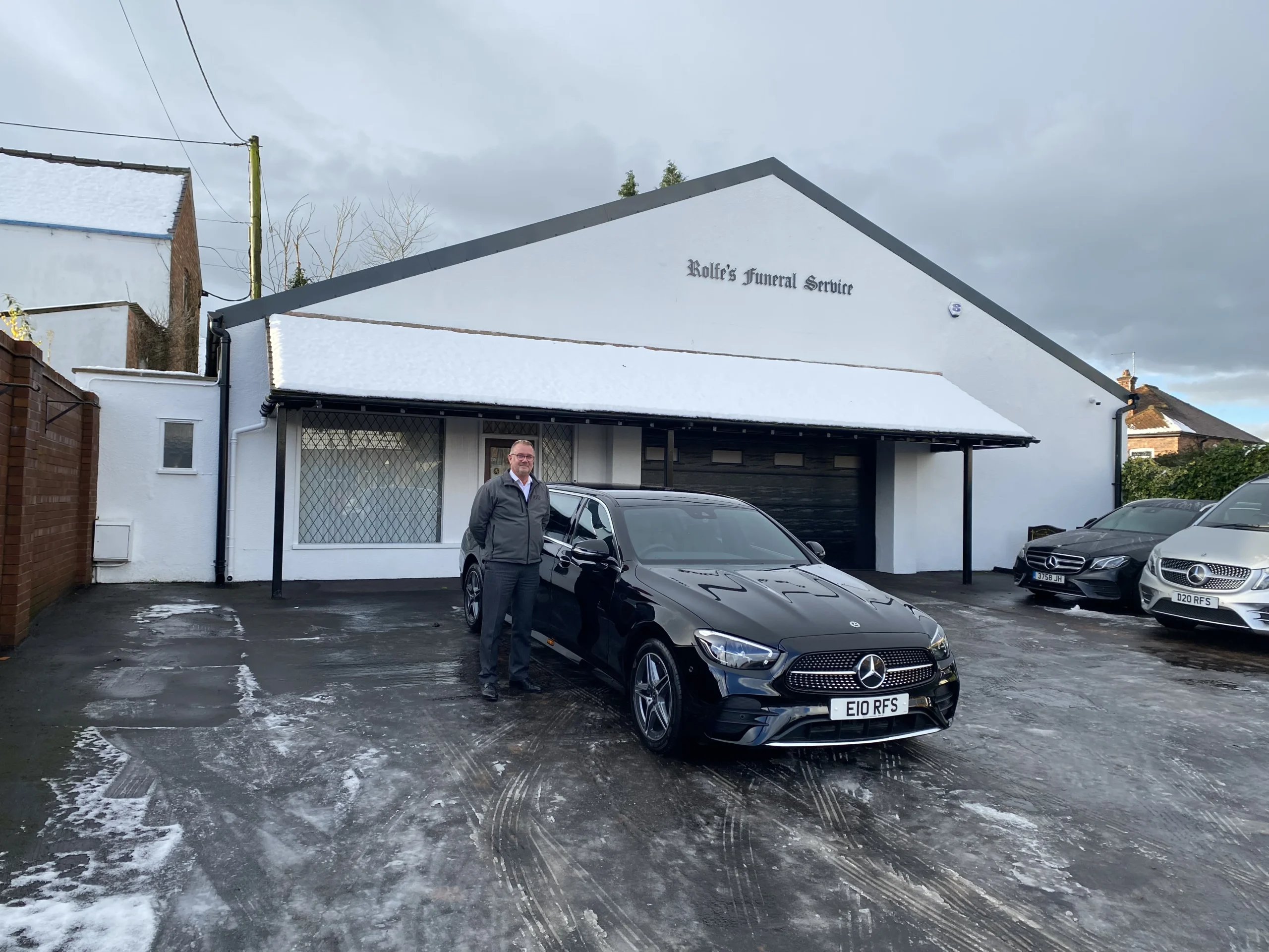 Wilcox Delivers a New Mercedes Limousine to Rolfe's Family Funeral Service ​
